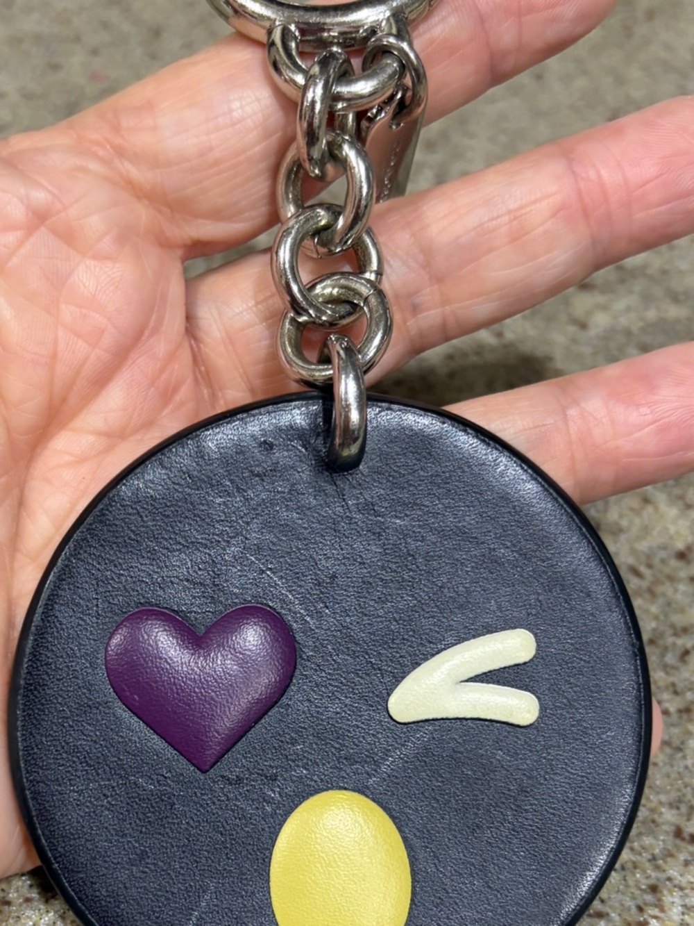COACH Black Round Emoji Keychain /bag charm with Purple Heart and Yellow Accent
